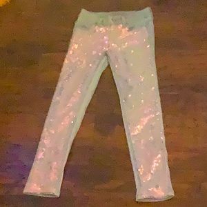 Justice shimmering sequin skinny jeans.